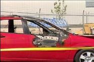 [Birgfelds torched 2005 Red Ford Focus, from FoxNews]